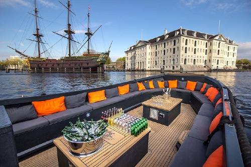 Amsterdam Canal Cruise in Luxury Open Boat - Small Group - from Anne Frank House